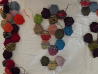 A handful of knitted hexagons makes a skull