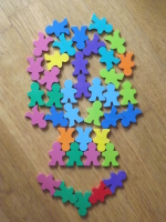 Skull patchworked out of little wooden men