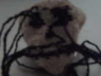 Inside out and creepy knitted skull