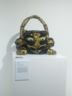 lion handbag photo of an elaborate handbag with a lion design